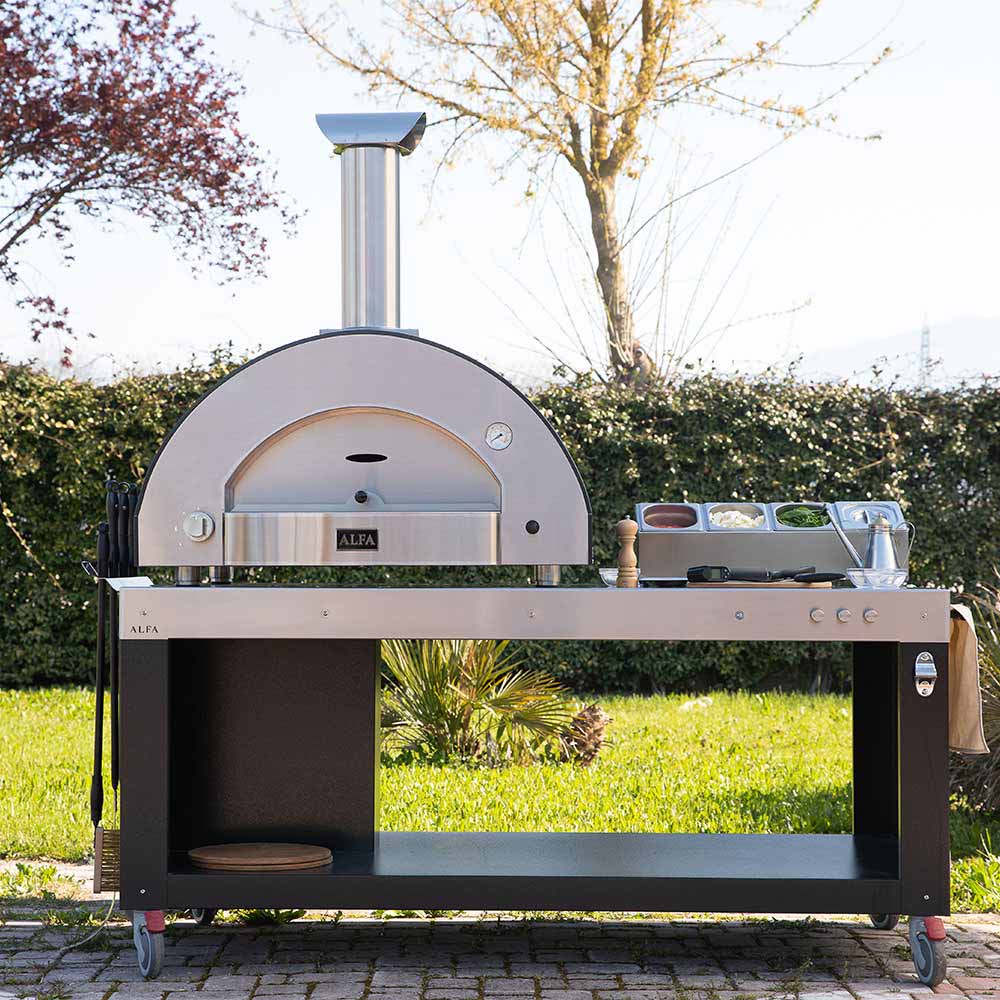 Outdoor countertop gas pizza oven with domed cooking chamber and control panel