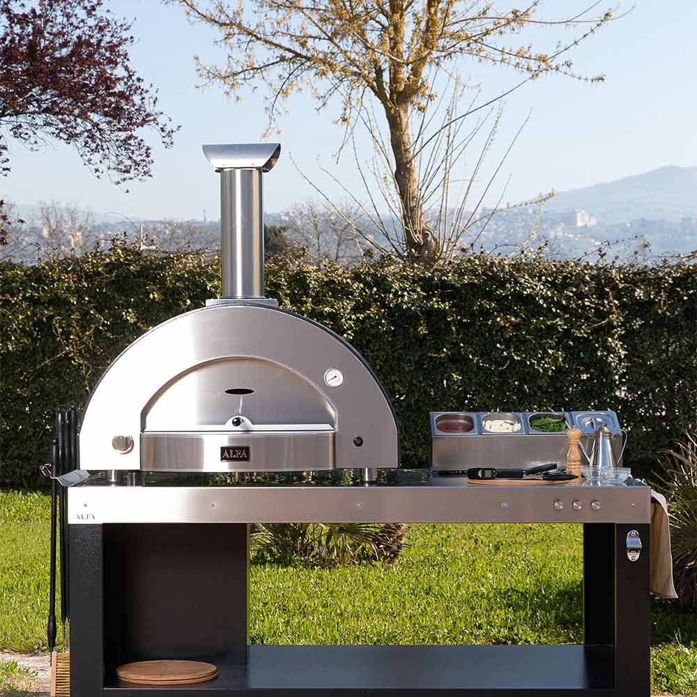 Stainless gas pizza oven on stand with domed cooking chamber and chimney