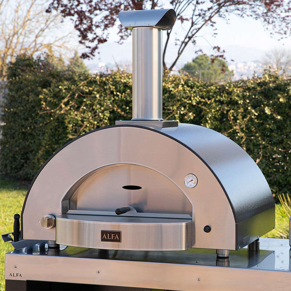 Outdoor gas pizza oven front view with stainless door and open baking chamber