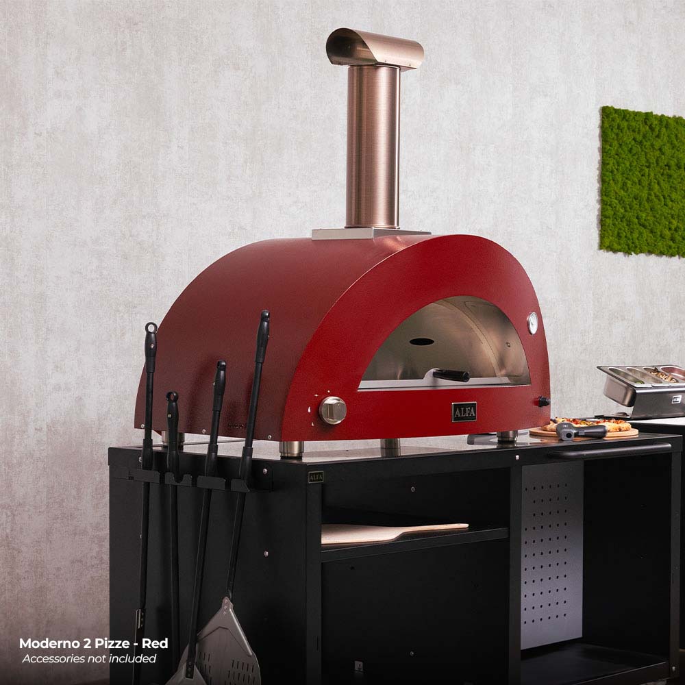 Wood-fired pizza oven with cooking station, red dome and utensil tools beside the stand
