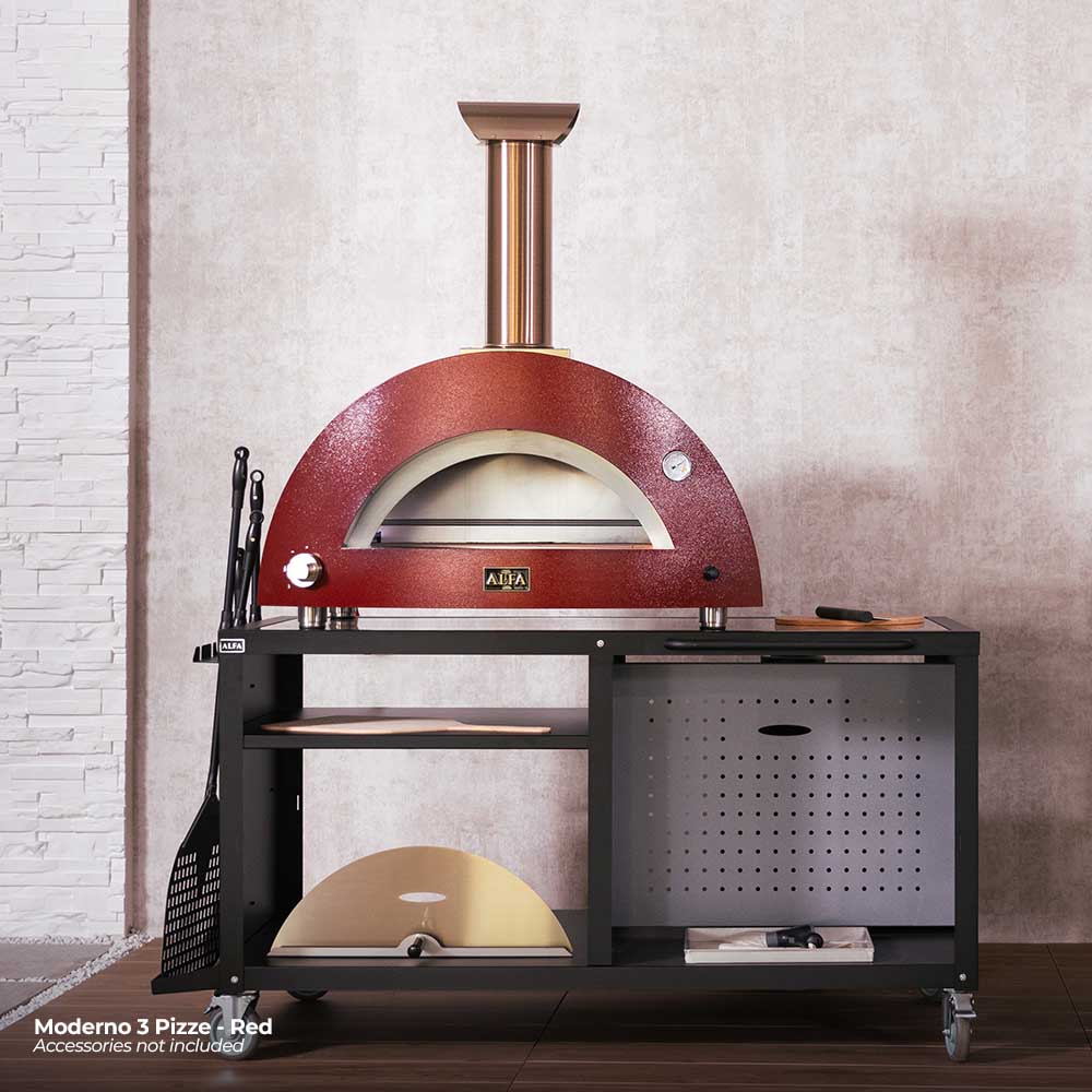 Red wood-fired pizza oven on black cart with chimney and arched oven opening