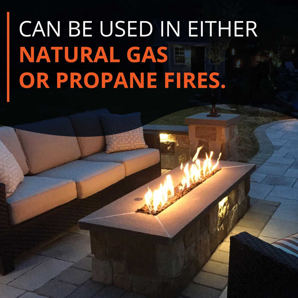 Fire pit with flames over decorative glass fill