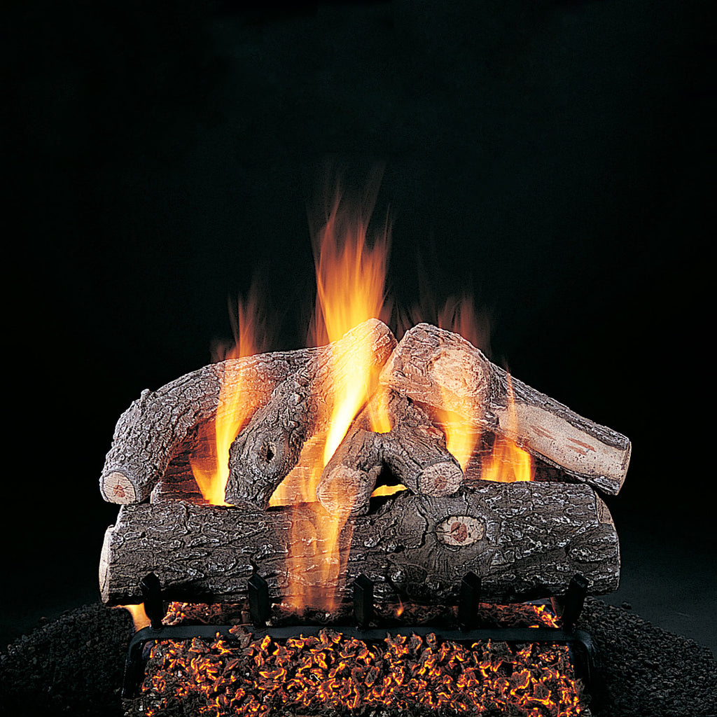 Burning frosted oak gas logs with glowing flames on log set