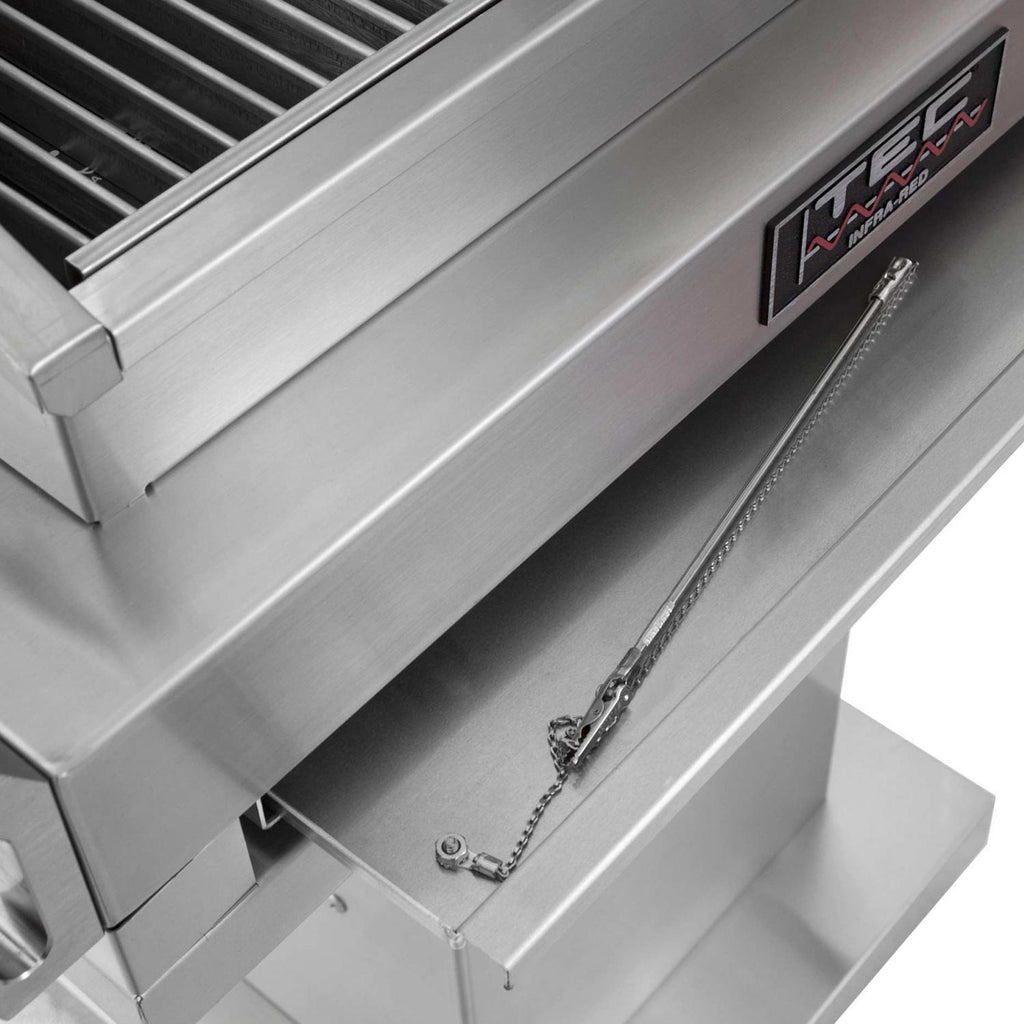 Stainless steel grill housing with control label and hanging chain detail on side panel