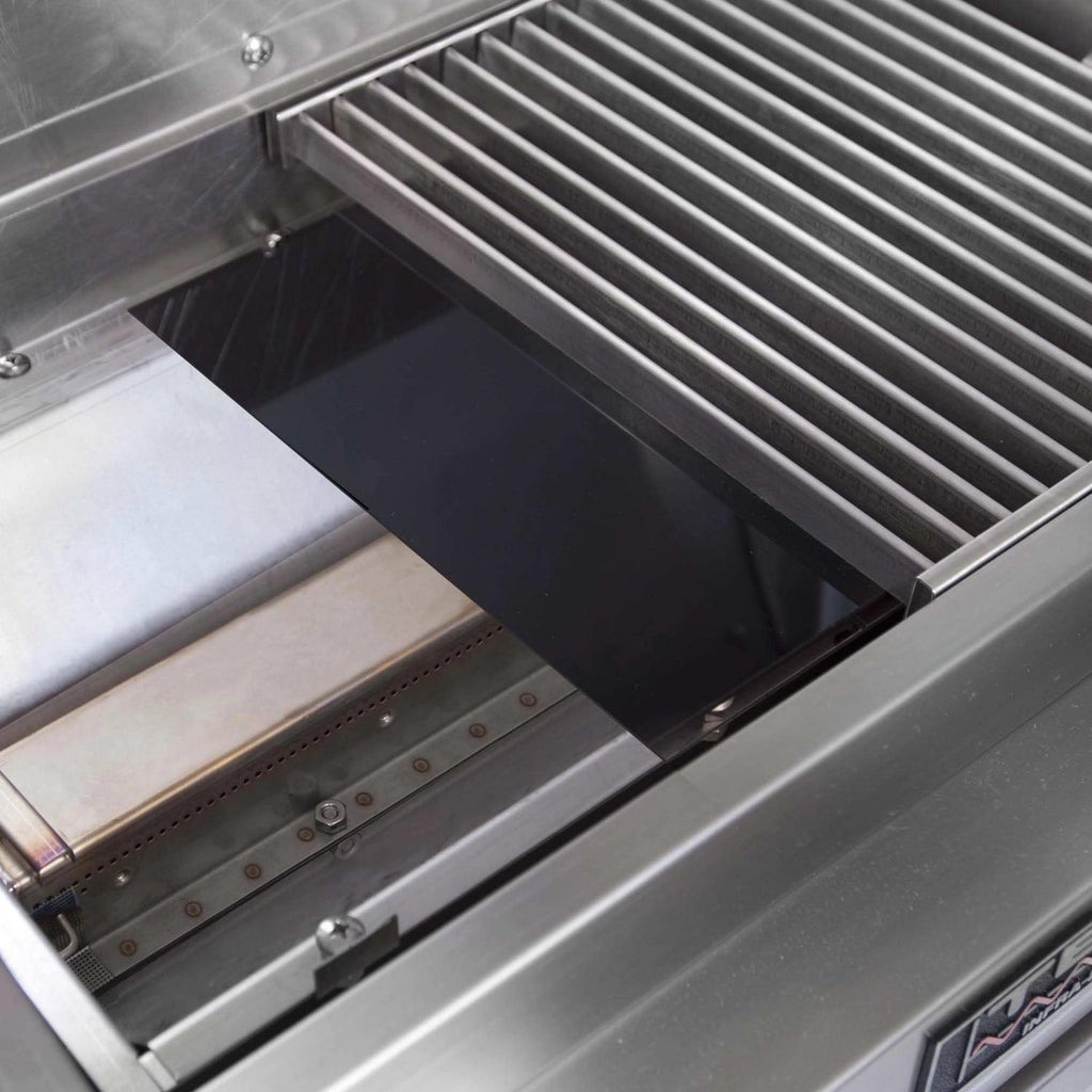 Tabletop infrared grill open with drip tray area and removable interior components