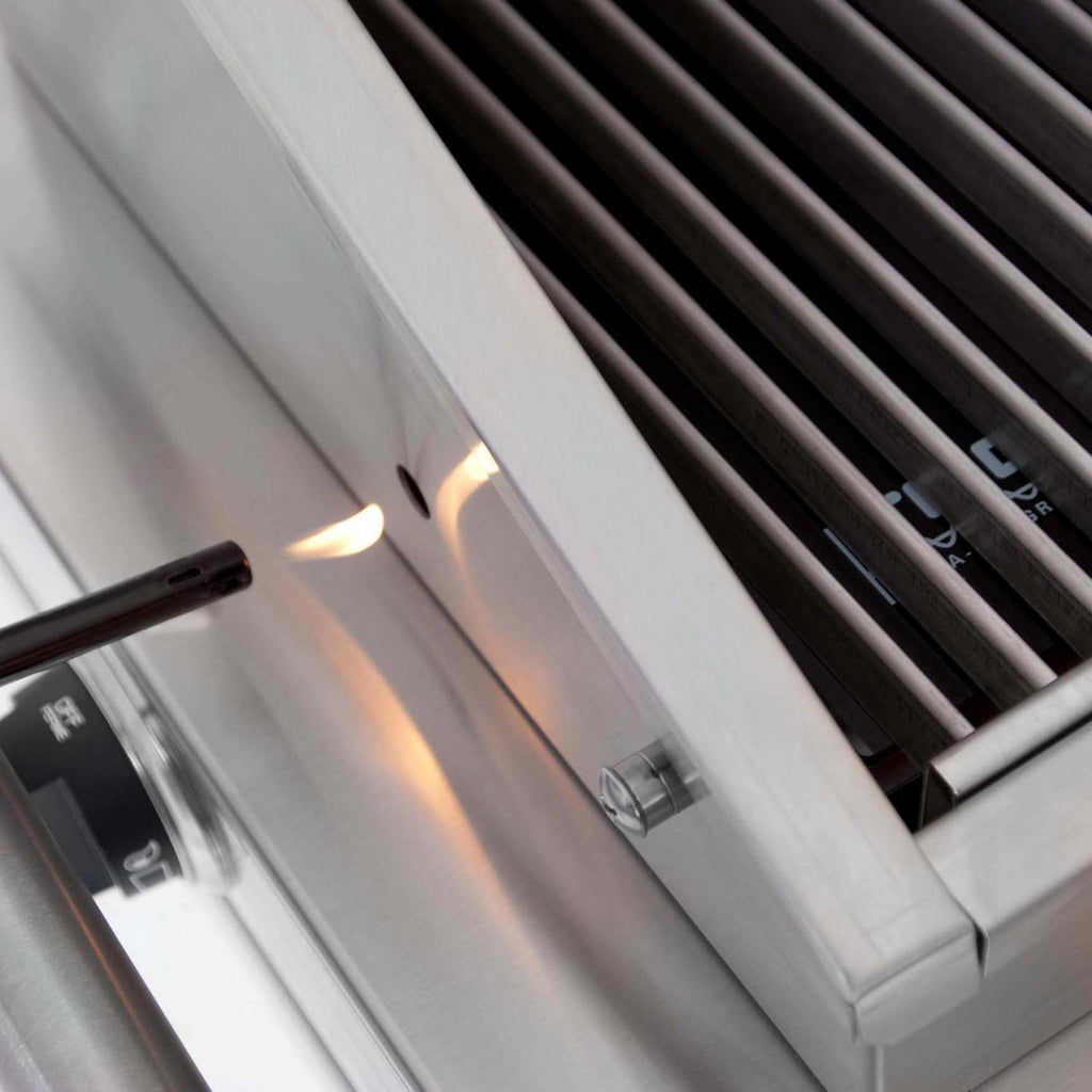 Tabletop infrared grill interior with lid open and control knob on the front panel