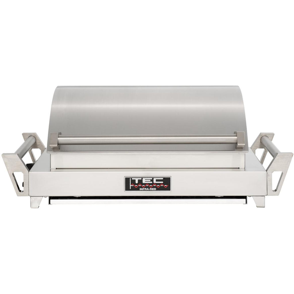 Tabletop infrared grill with lid closed and side handles, stainless steel body