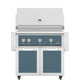 Freestanding 36-inch gas grill with blue-green control panel and matching blue-green side doors.