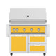 Freestanding gas grill with yellow control panel and stainless doors and drawers