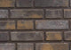 Dark gray brick decorative fireplace panels with rectangular staggered pattern