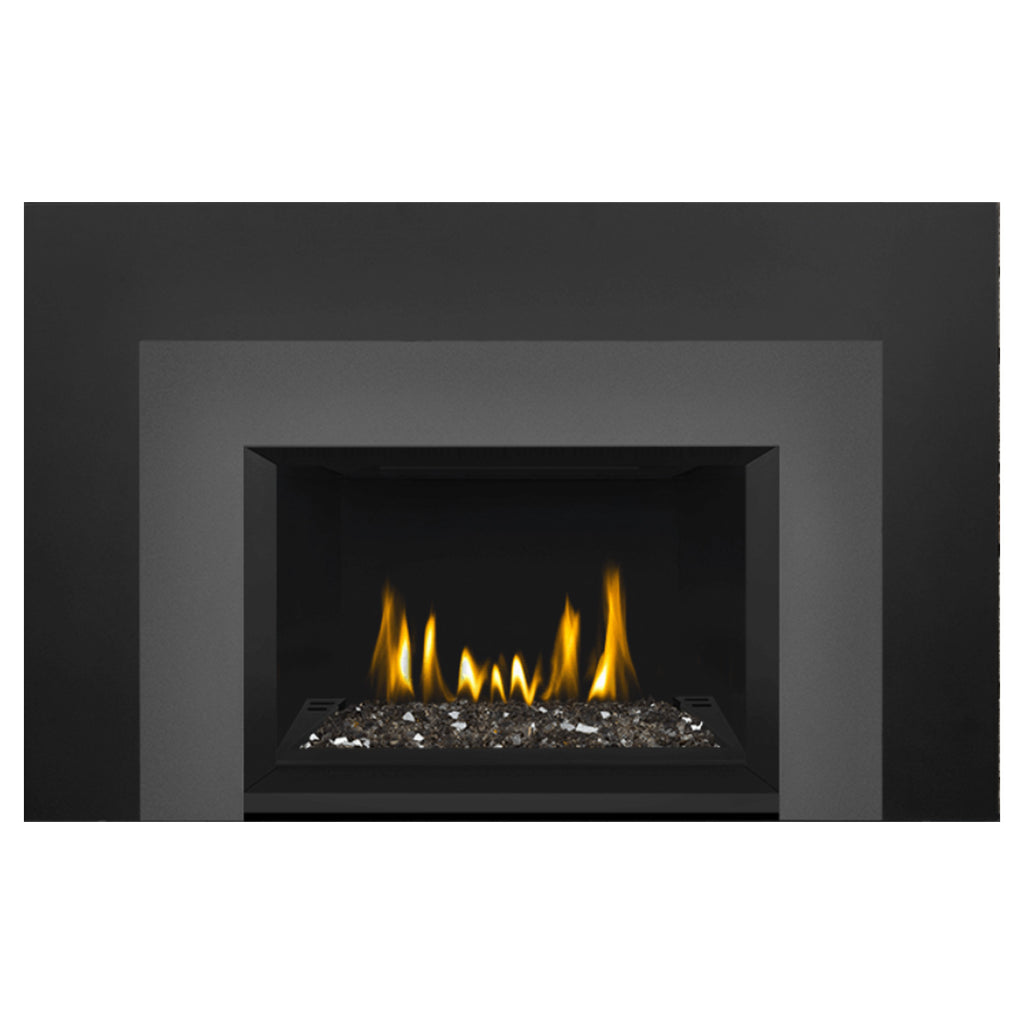 Direct vent gas fireplace insert with glass ember bed and visible flames