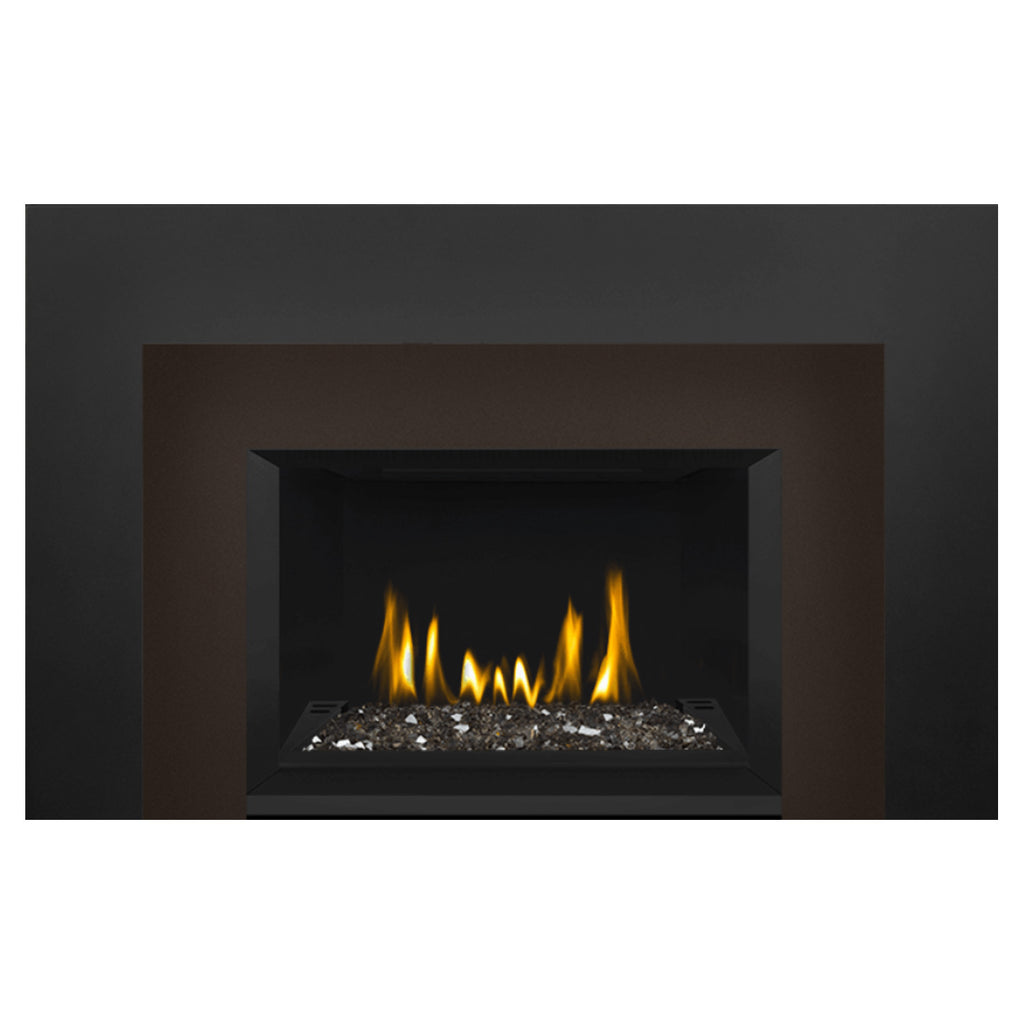 Direct vent gas fireplace insert with glass ember bed, black opening with burning flames.