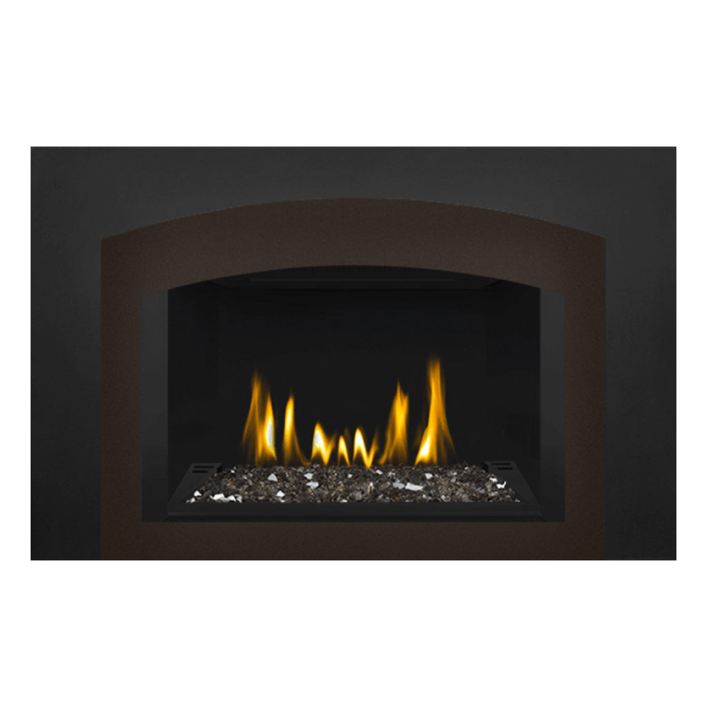 Direct vent gas fireplace insert with glass front, ember bed, and bright flame flames