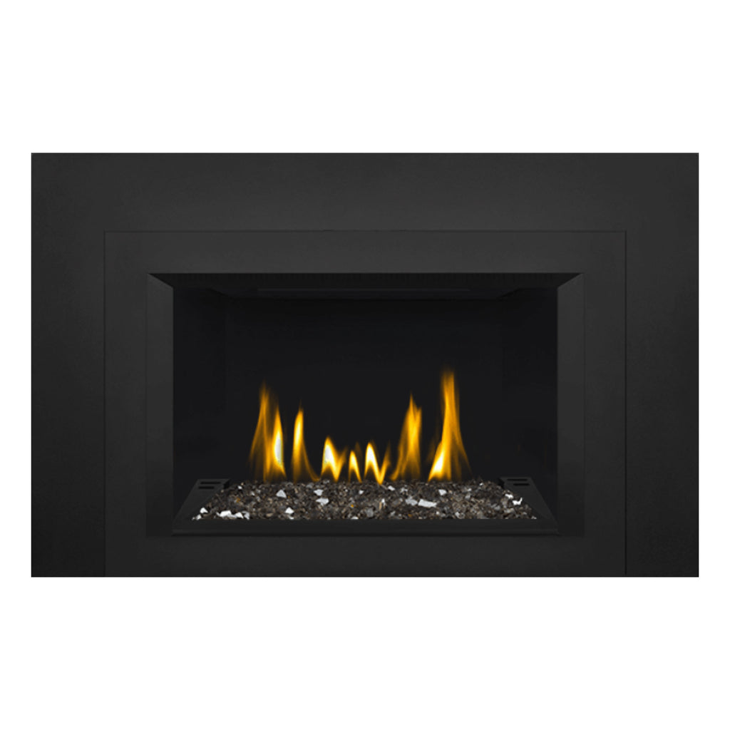 Direct vent gas fireplace insert with glass ember bed and yellow flames, dark surround frame