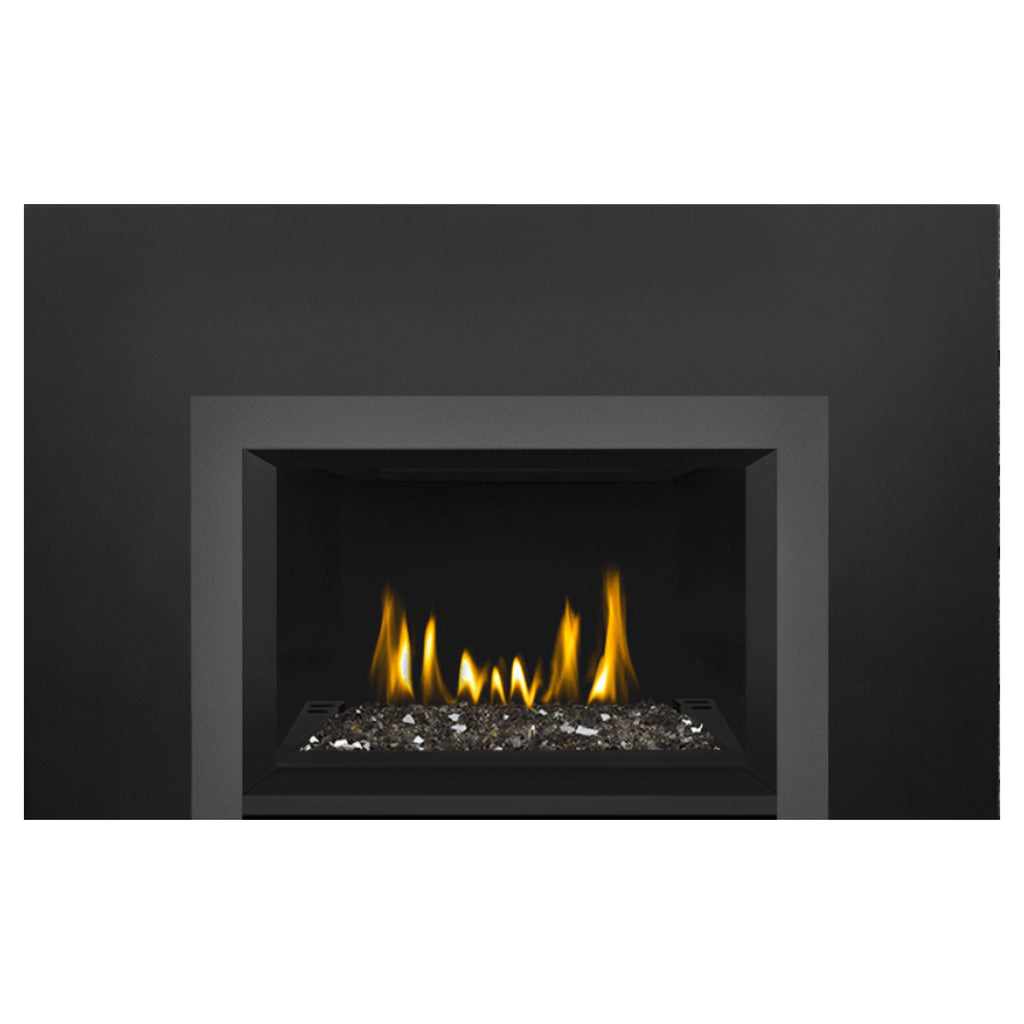 Direct vent gas fireplace insert with glass ember bed glowing under visible yellow flames, black