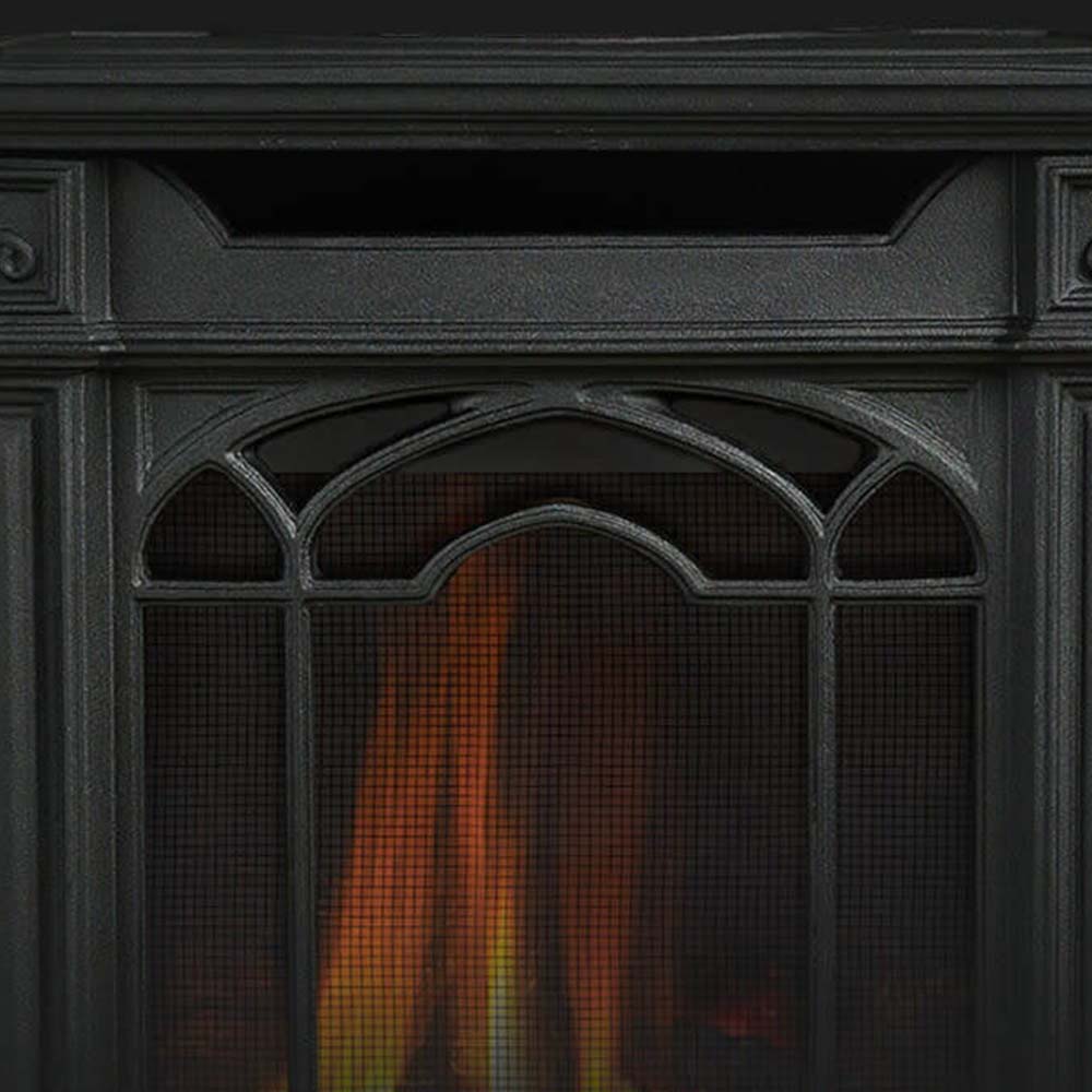 Black cast iron stove door with arched glass panel and visible flame interior