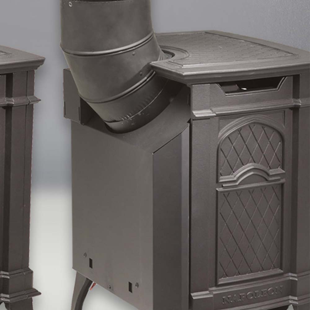 Black cast iron stove side panel with vent pipe and arched door window