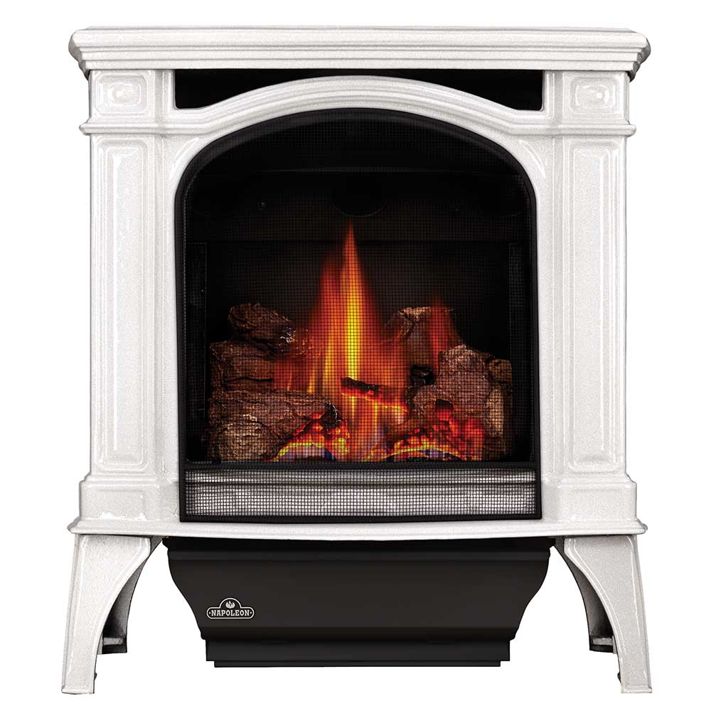 White cast iron gas stove with arched firebox and flame viewing window