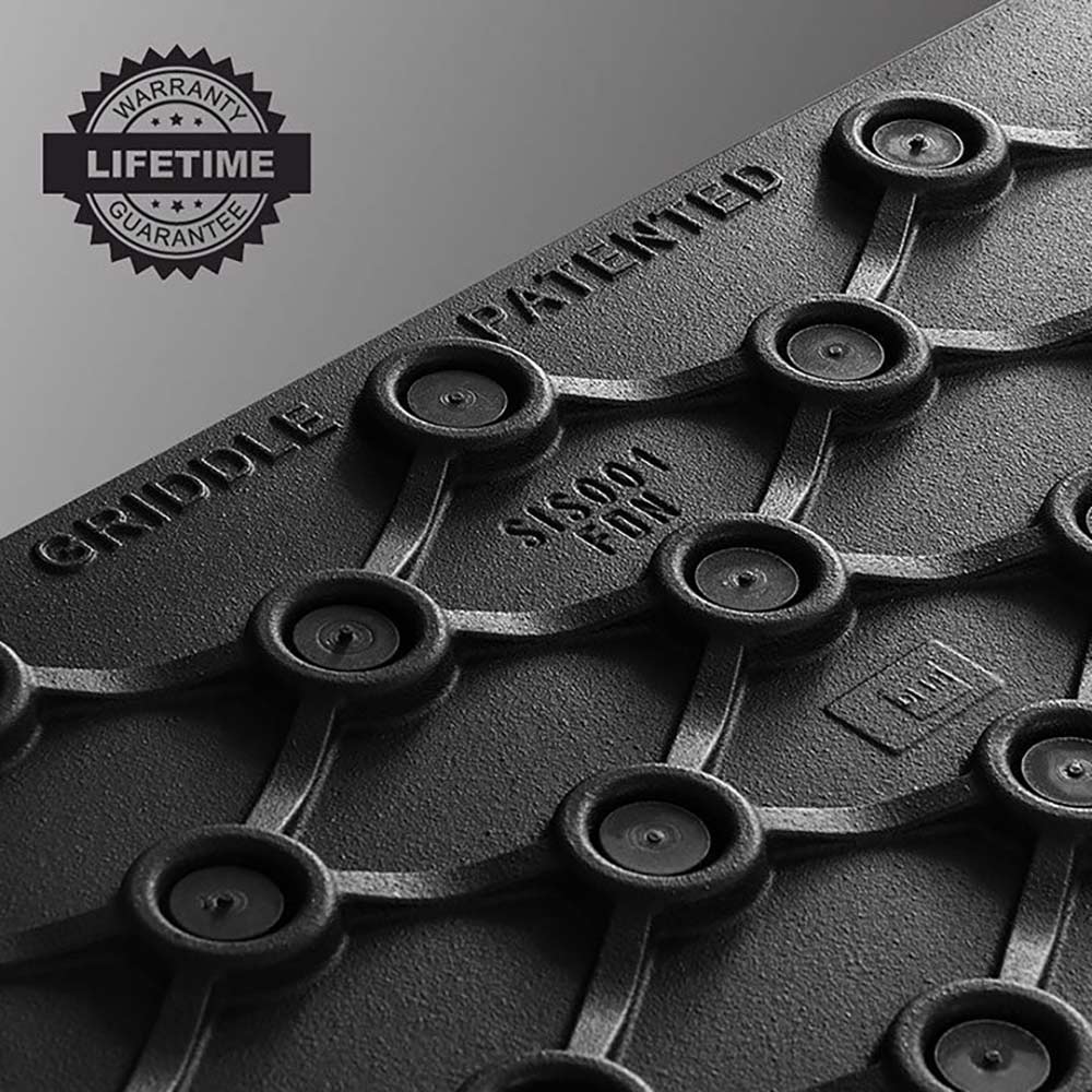 Cast iron cooking surface with multiple circular heat elements and warranty seal