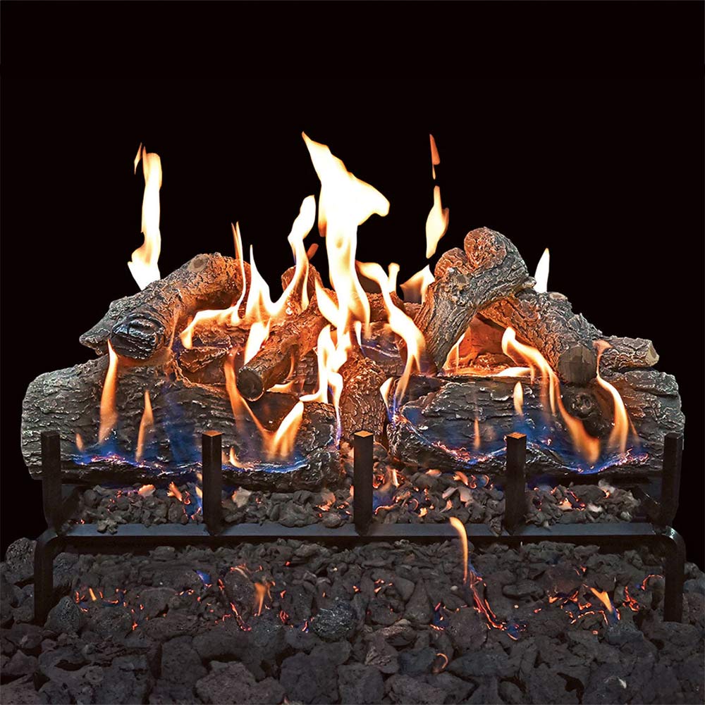 Charred wood gas log set burning with multiple flames and front black log supports