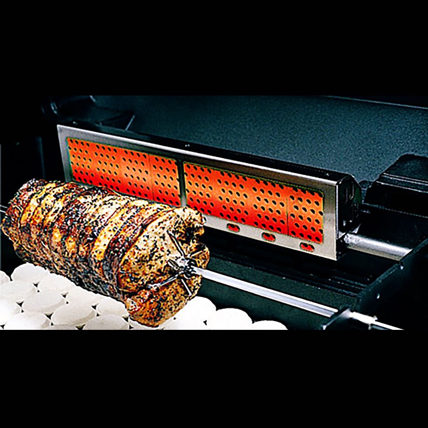Infra-red rotisserie burner with perforated red guard and rotisserie rod