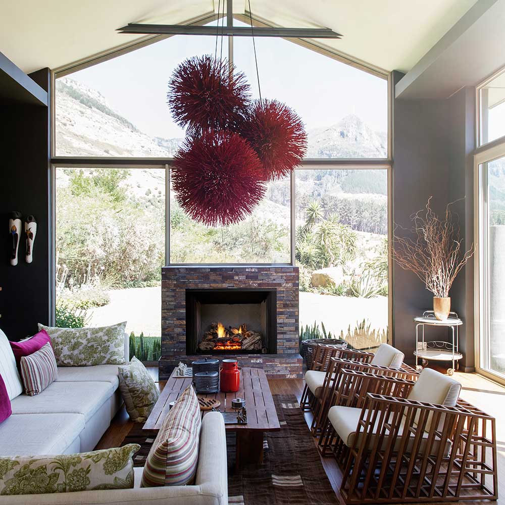 Vent-free gas log set burning inside a fireplace with visible flame and logs
