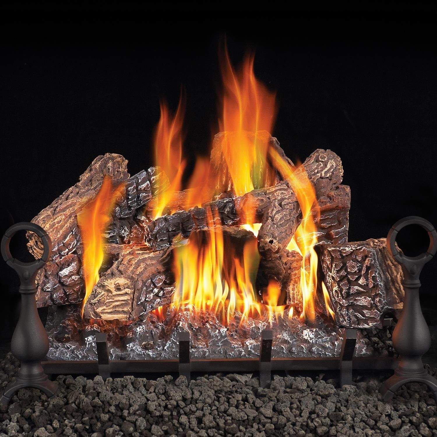 Vented gas log set front view with burning flames, faux logs, and lava rock base.
