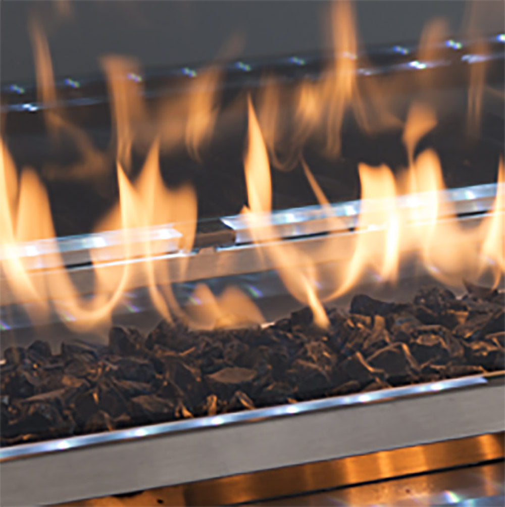 Crushed black glass fire media, glowing in a fire bed