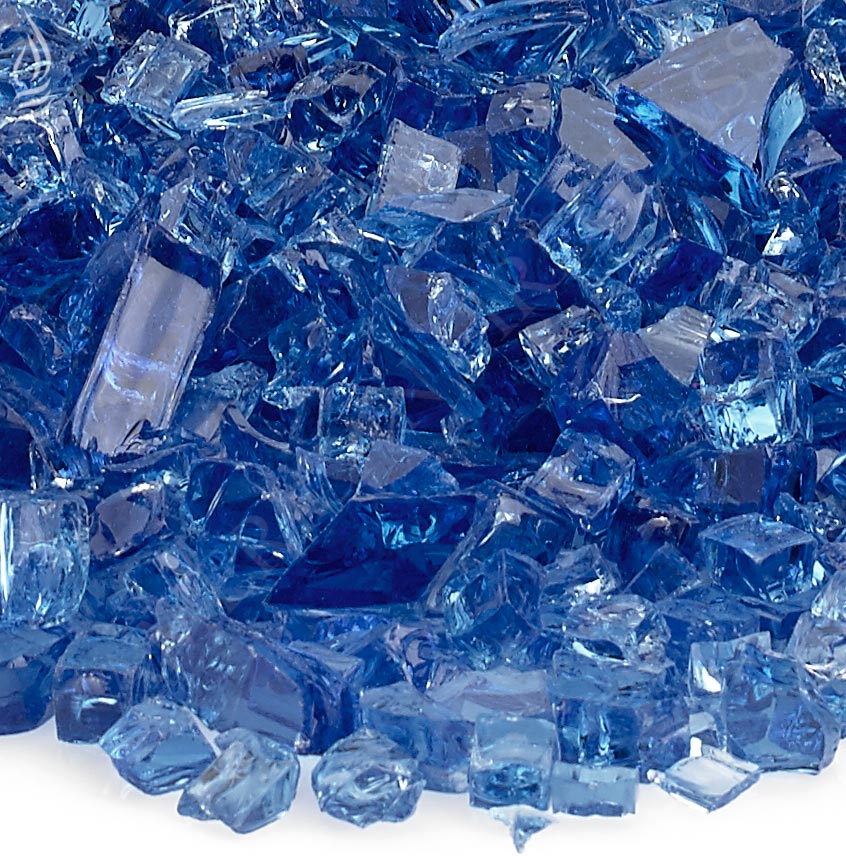 Cobalt blue fire glass pieces close-up with sharp faceted edges