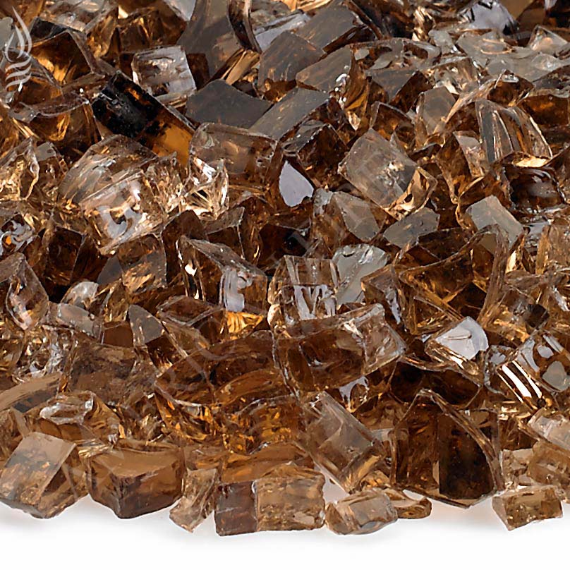 Close-up of copper fire glass shards, assorted clear bronze reflective fragments