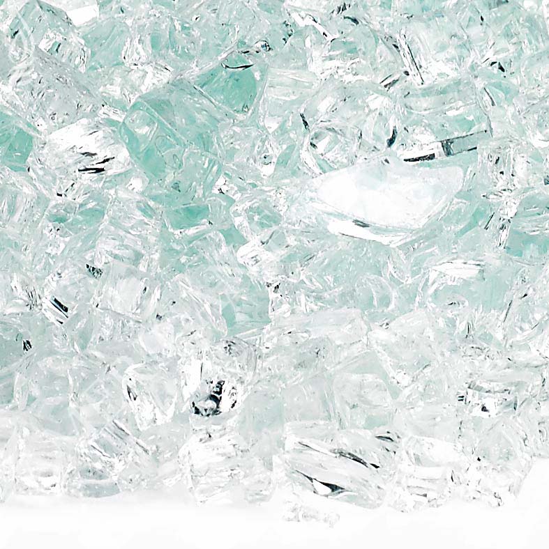 Ice blue and clear fire glass crystals, close-up of mixed glass pieces