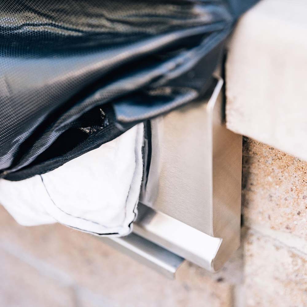 Built-in grill cover corner detail with elastic hem and side flap