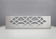 Ornamental chrome trivet with crosshatched lattice cutout pattern