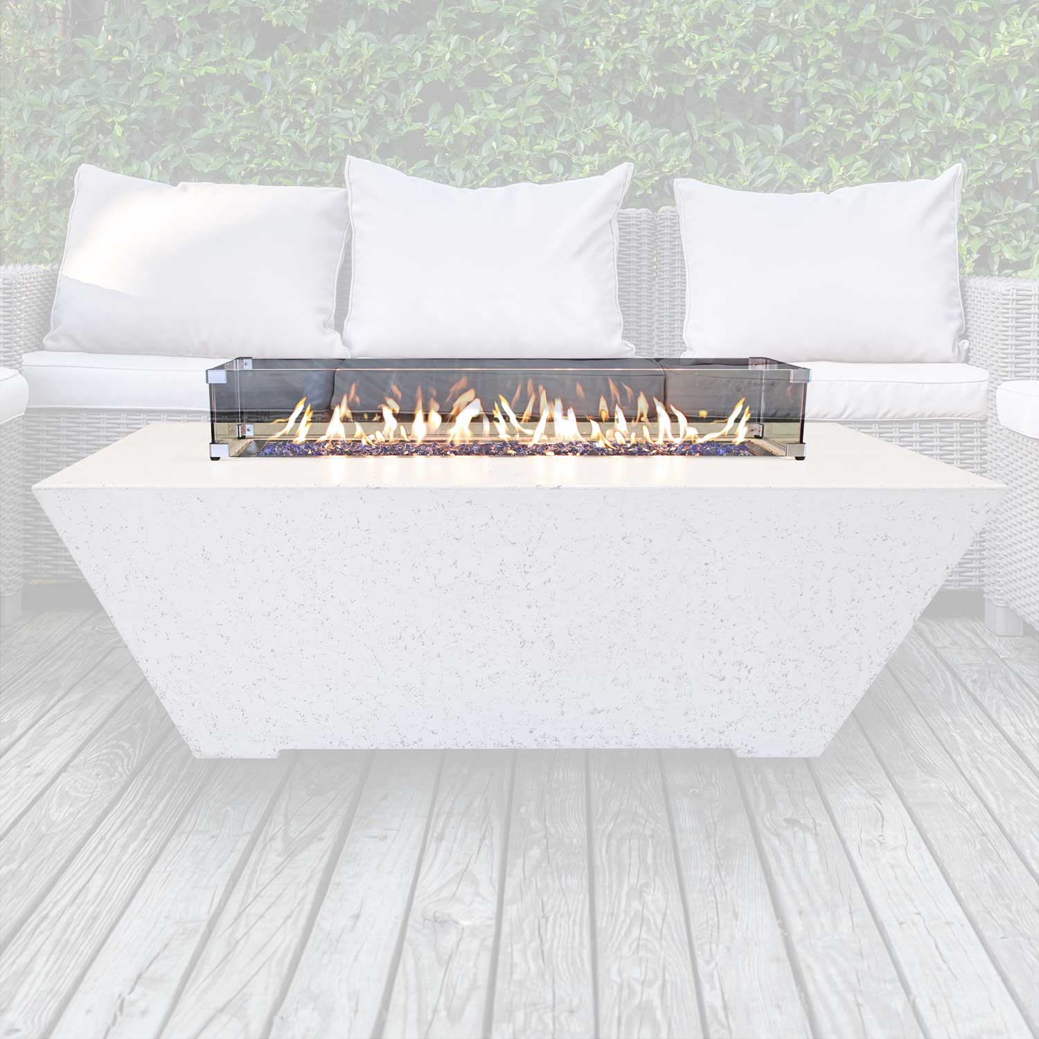 Rectangular glass wind guard on concrete fire pit with flames visible behind glass