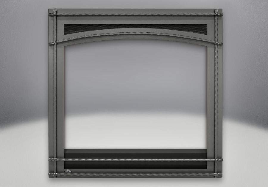 Decorative wrought iron fireplace front with rectangular frame and arched center panel