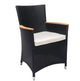 Black woven wicker armchair with white seat cushion and curved wooden armrest