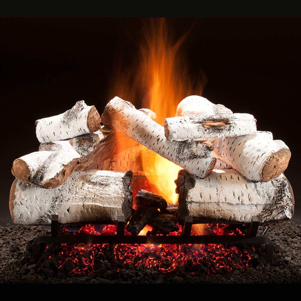 Vented gas log set with white aspen-style timbers and glowing embers