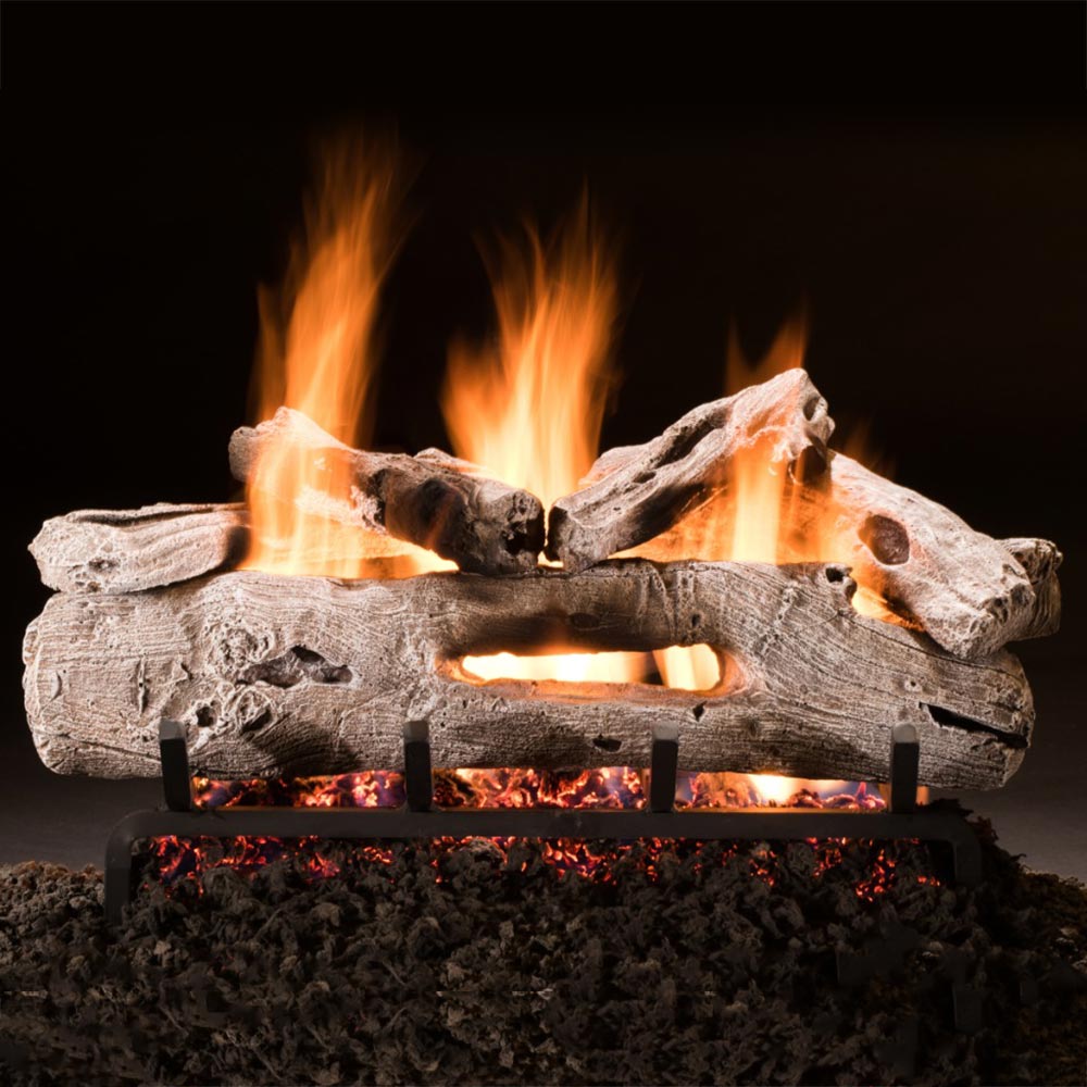 Wooden logs burning in a fireplace with flames against a dark background from Hargrove