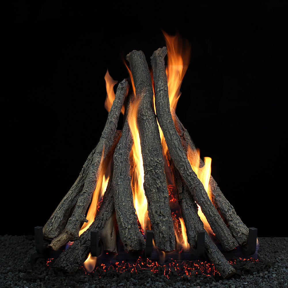 Vented gas log set with stacked logs and visible flames