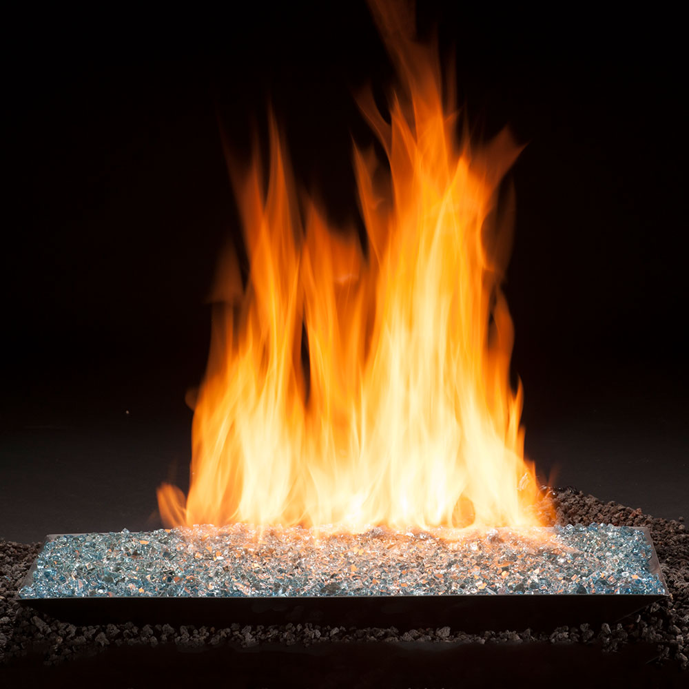 Vented gas fire burner pan with burning flames and dark fire glass