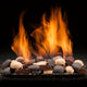 Gas fireplace pan burner with blazing flames over river stones