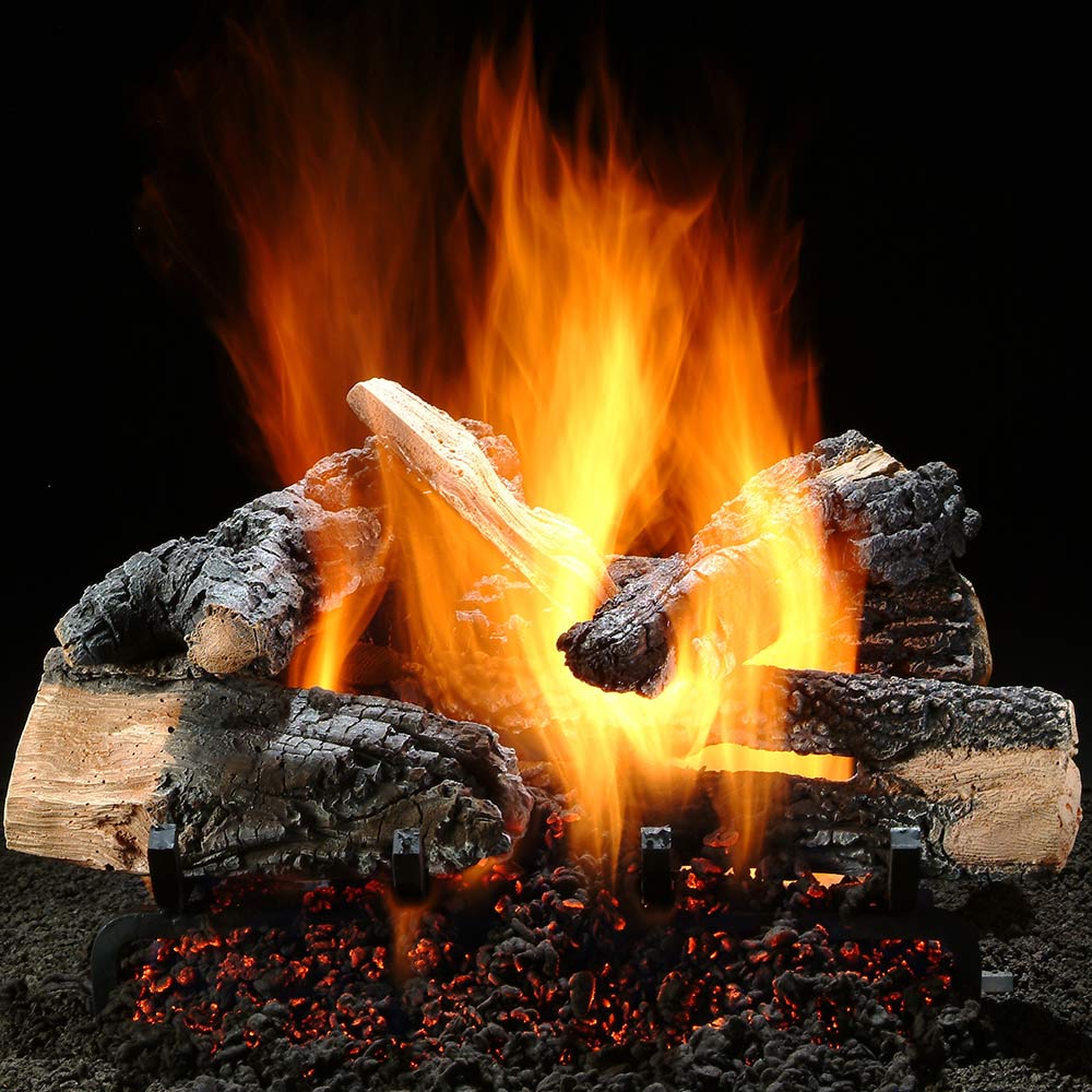 Vented gas log set with burning flames, tan logs and dark charred pieces