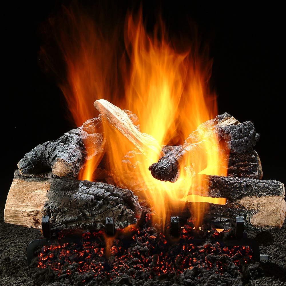 Vented gas log set with burning flames, black logs, and glowing red embers