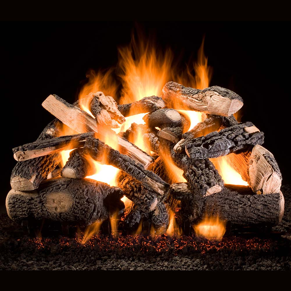 Vented gas log set with stacked wood-style logs, glowing embers and active flames
