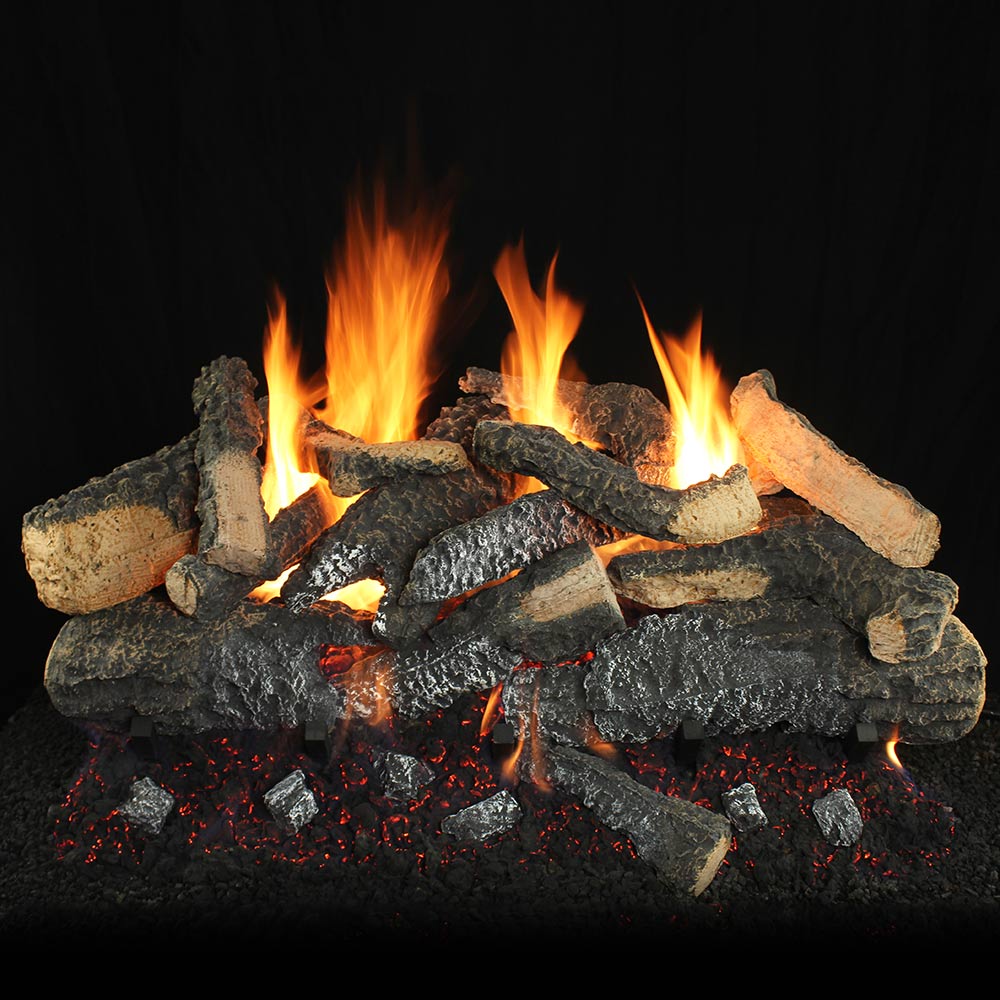 Vented gas log set with stacked logs and glowing flames over an ember bed