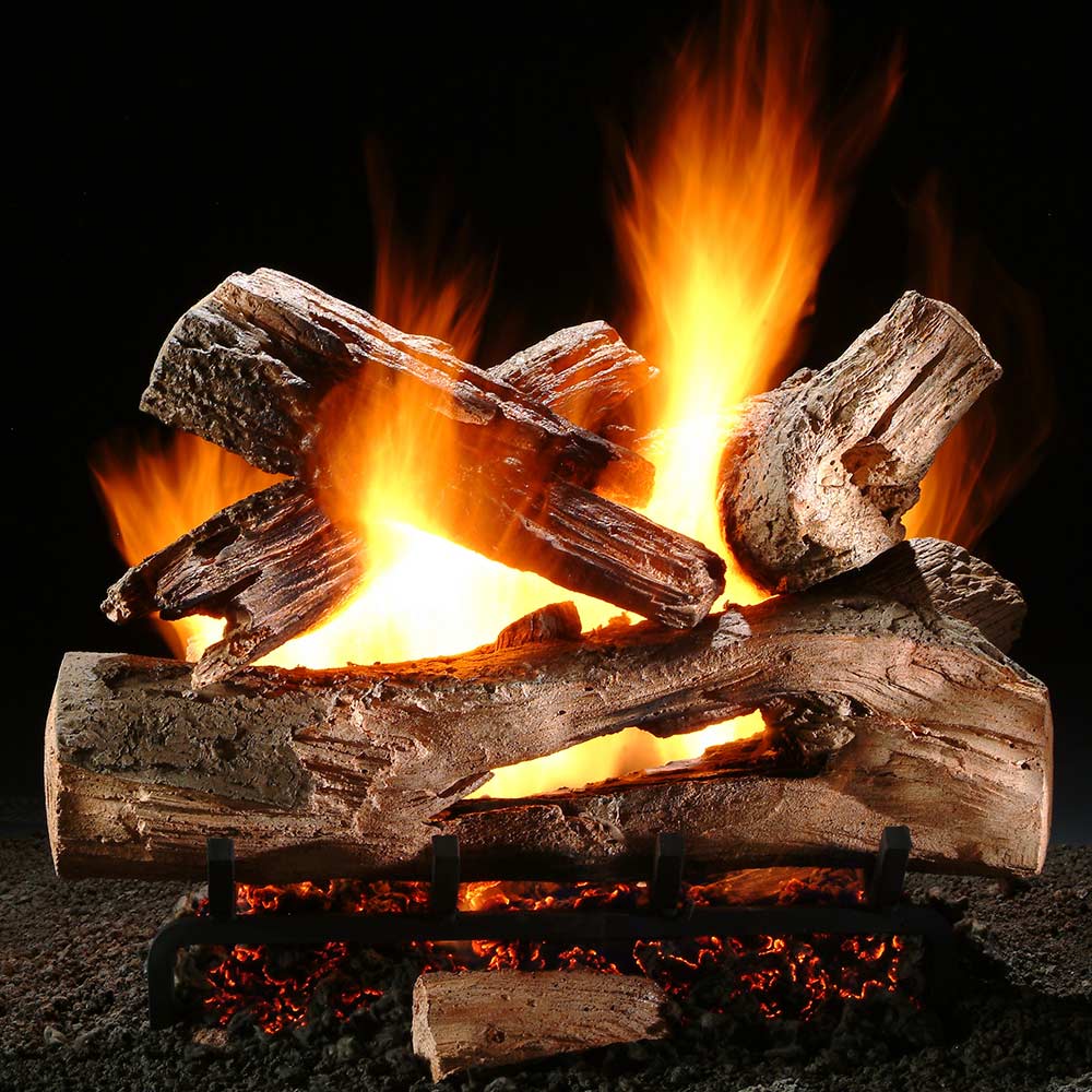 Vented gas log set with glowing logs and open flame
