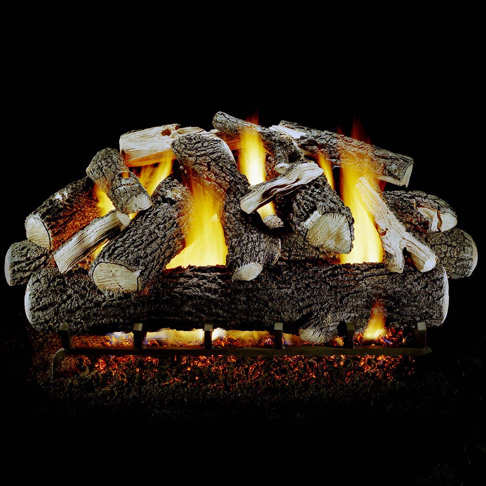 Vented gas log set with burning flames among dark, textured logs