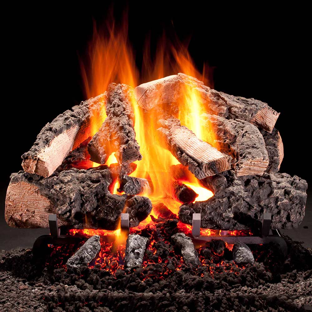 Vented gas log set with glowing embers and stacked wood logs, bright orange flames