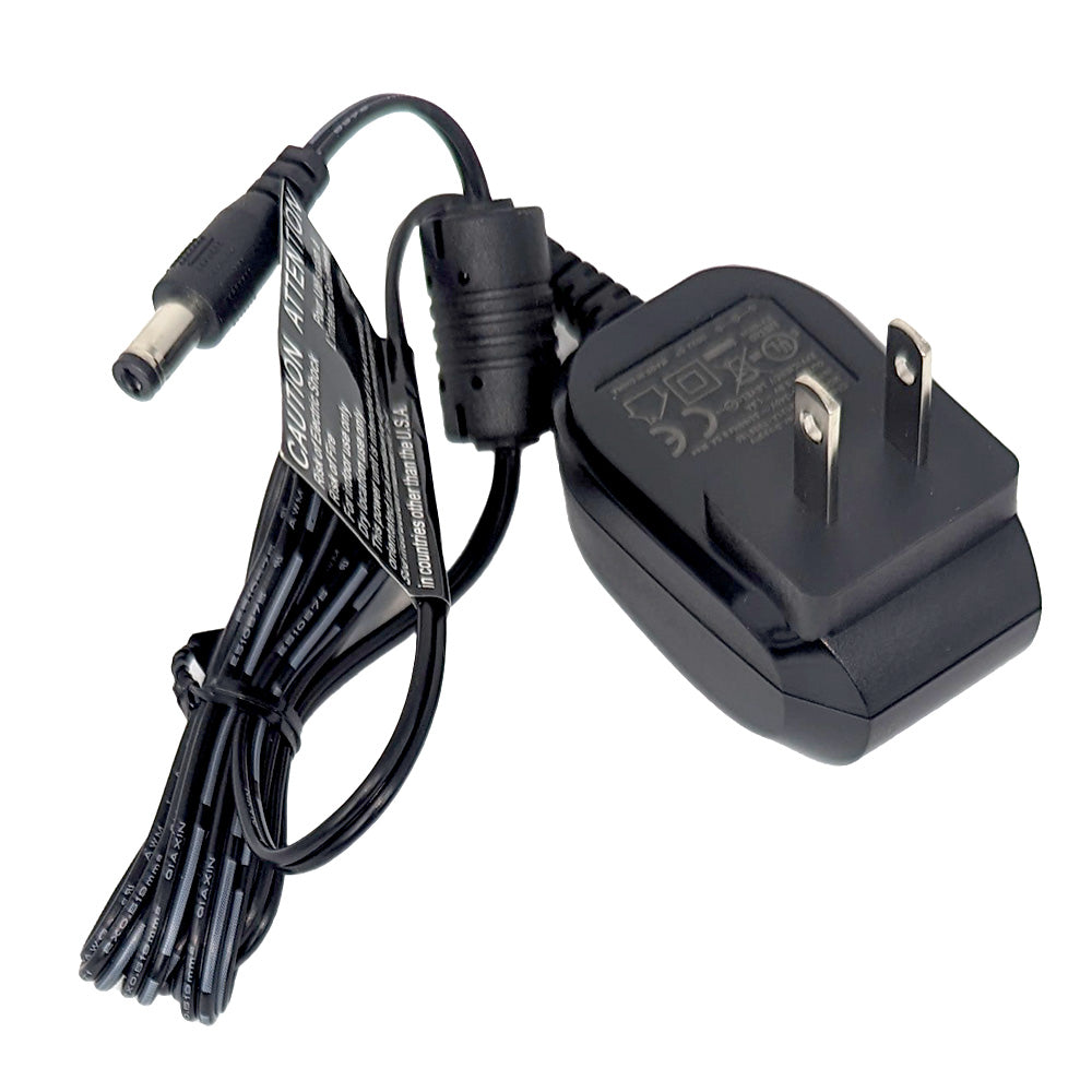 6-volt wall transformer with black power cord and low-voltage plug