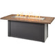 Linear gas fire table with driftwood-look top and black base, glass burner with flames
